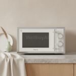 대용량 전자레인지 25L Surface: Textured beige plaster wall as